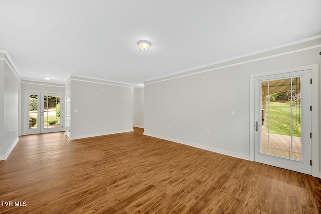 211 University Pkwy Unit 5, Johnson City, TN 37604 - unfurnished living room with baseboards, crown molding, and wood finished floors