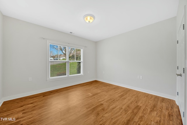 211 University Pkwy Unit 5, Johnson City, TN 37604 - unfurnished room featuring baseboards and wood finished floors