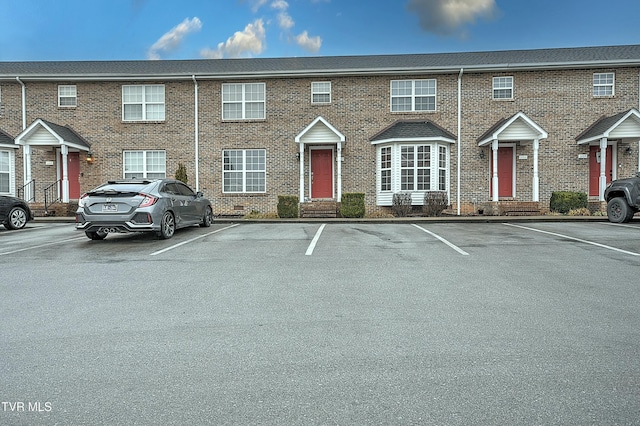 305 Waterford Ct Unit 305, Johnson City, TN 37615 - view of front facade with uncovered parking, crawl space, and brick siding