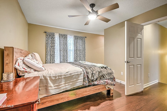 305 Waterford Ct Unit 305, Johnson City, TN 37615 - bedroom with baseboards, a ceiling fan, wood finished floors, and a textured ceiling
