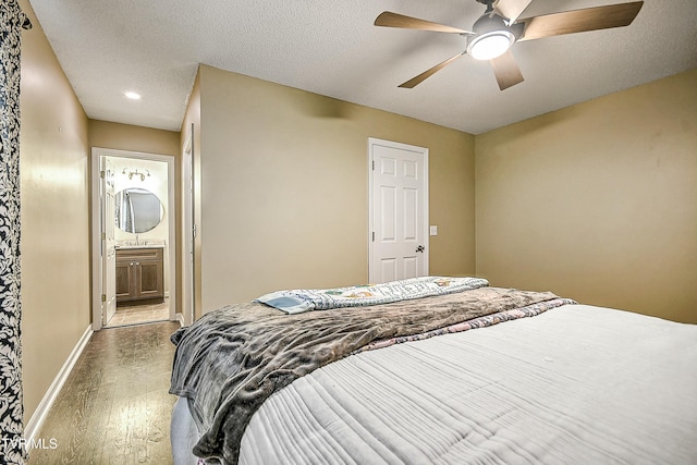 305 Waterford Ct Unit 305, Johnson City, TN 37615 - bedroom featuring ensuite bathroom, a ceiling fan, recessed lighting, wood finished floors, and baseboards