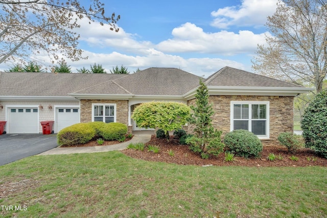 211 University Pkwy Unit 16, Johnson City, TN 37604 - single story home with stone siding, a front lawn, an attached garage, a shingled roof, and driveway