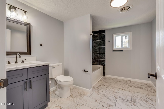 bathroom with baseboards, marble look tiles, toilet, vanity, and a textured ceiling