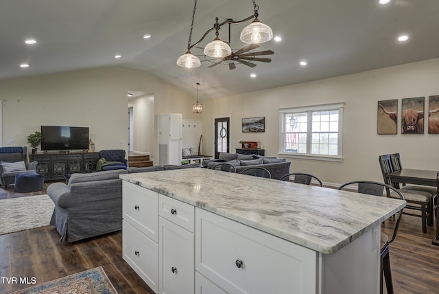 368 New Hope Rd, Jonesborough, TN 37659 - kitchen with open floor plan, a ceiling fan, dark wood-style floors, white cabinetry, and vaulted ceiling