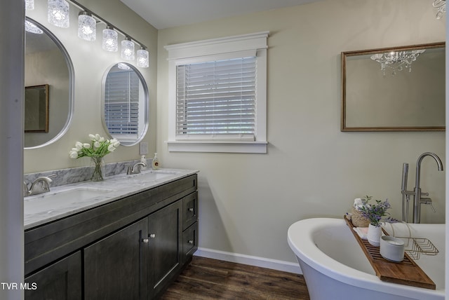 368 New Hope Rd, Jonesborough, TN 37659 - bathroom featuring double vanity, wood finished floors, and a soaking tub
