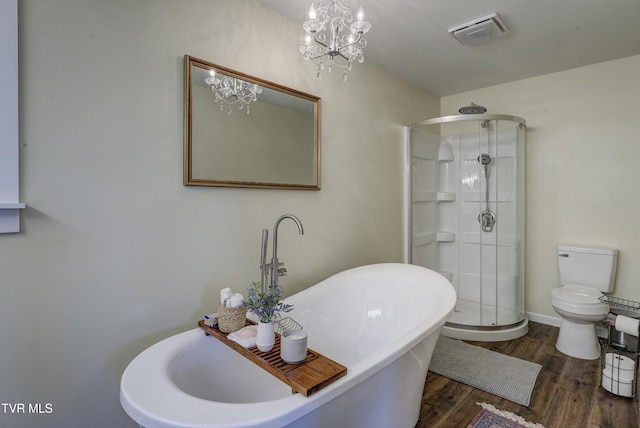 368 New Hope Rd, Jonesborough, TN 37659 - full bath featuring a shower stall, a freestanding bath, wood finished floors, and a chandelier