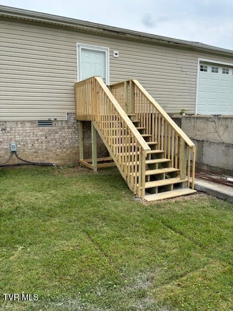 2847 Carrollwood Heights Rd, Kingsport, TN 37660 - back of property with a yard, crawl space, and stairway