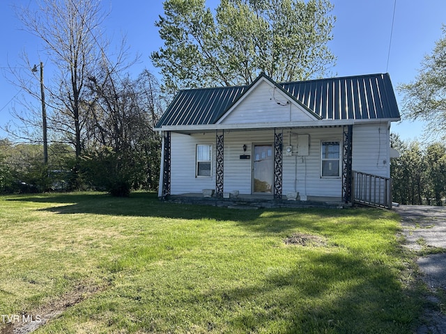 604 E Church Hill St, Greeneville, TN 37745 - view of front of property featuring a porch, metal roof, and a front yard