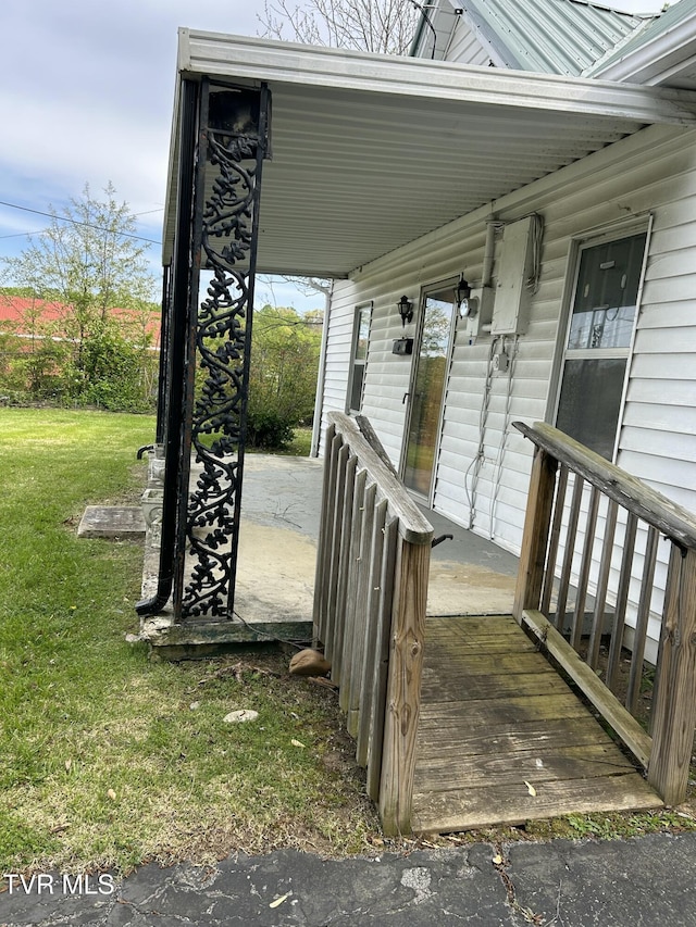 604 E Church Hill St, Greeneville, TN 37745 - wooden deck featuring a yard
