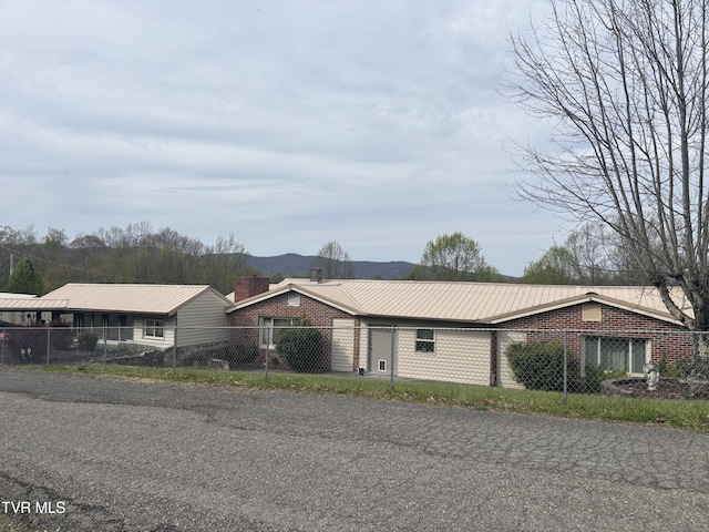 490 Delaney Ln, Clintwood, VA 24228 - single story home with metal roof and fence private yard
