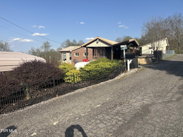 490 Delaney Ln, Clintwood, VA 24228 - view of side of property with fence private yard