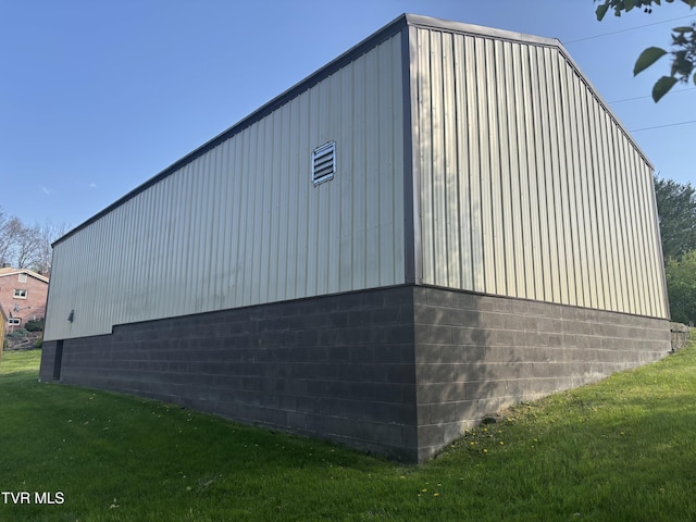 490 Delaney Ln, Clintwood, VA 24228 - view of side of property featuring a lawn and concrete block siding