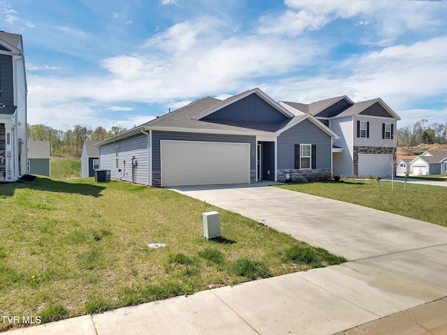 1245 Cherry Grv, Greeneville, TN 37745 - view of front of home with stone siding, concrete driveway, a garage, board and batten siding, and a front yard