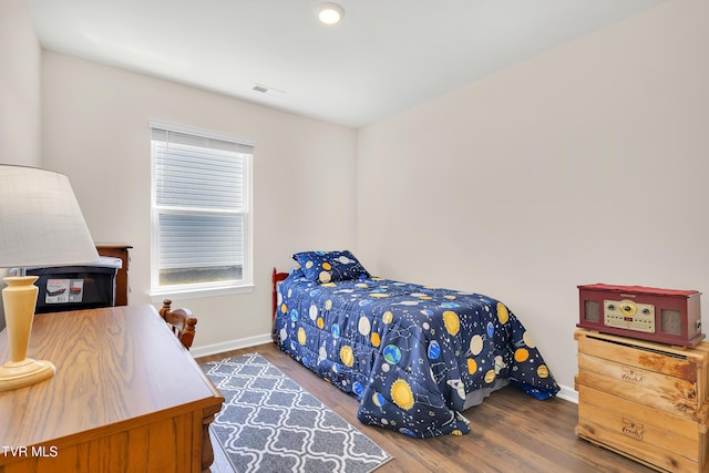 1245 Cherry Grv, Greeneville, TN 37745 - bedroom featuring baseboards and wood finished floors