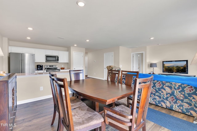 1245 Cherry Grv, Greeneville, TN 37745 - dining area featuring dark wood-type flooring and recessed lighting