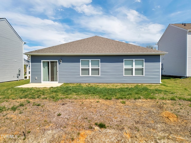1245 Cherry Grv, Greeneville, TN 37745 - rear view of house featuring a patio, roof with shingles, and a yard