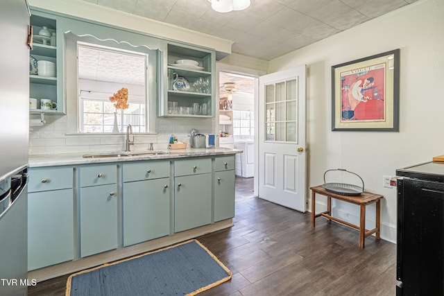 313 SE Tanner St, Abingdon, VA 24210 - kitchen featuring a sink, dark wood-style flooring, decorative backsplash, open shelves, and light countertops