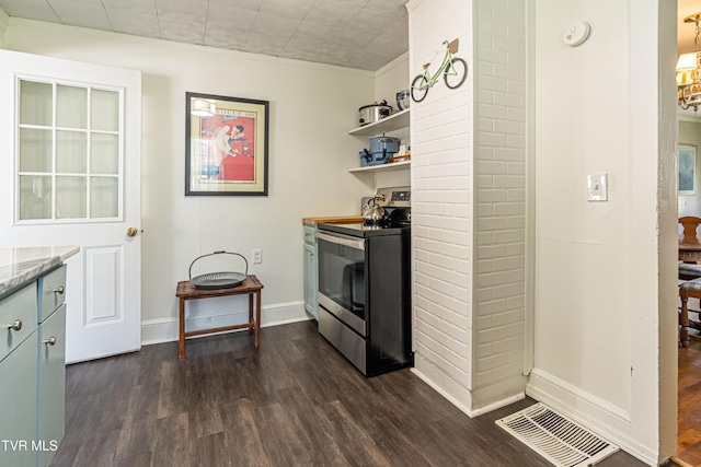 313 SE Tanner St, Abingdon, VA 24210 - kitchen with dark wood finished floors, electric range, baseboards, visible vents, and open shelves