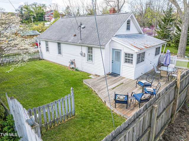 313 SE Tanner St, Abingdon, VA 24210 - back of house with a chimney, a fenced backyard, a yard, a wooden deck, and roof with shingles
