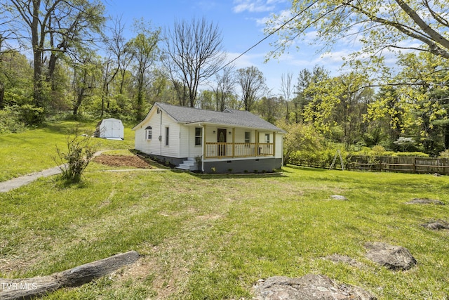 1219 Ledford St, Elizabethton, TN 37643 - view of front facade with a porch, crawl space, and roof with shingles