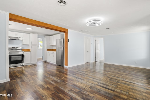 1219 Ledford St, Elizabethton, TN 37643 - unfurnished living room with dark wood-style floors, baseboards, and recessed lighting