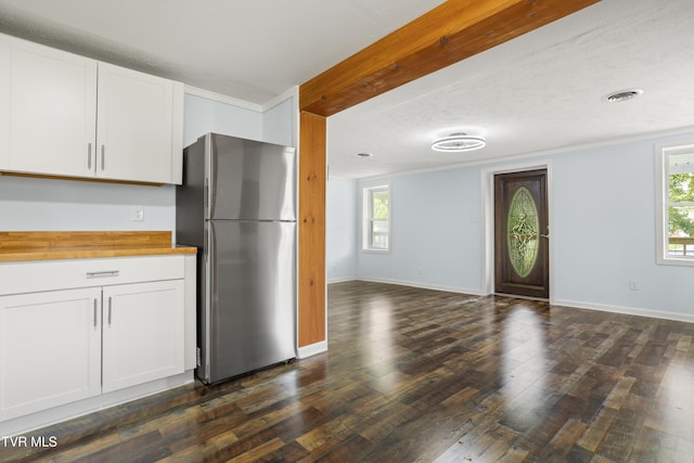 1219 Ledford St, Elizabethton, TN 37643 - kitchen featuring freestanding refrigerator, dark wood-style flooring, white cabinetry, butcher block counters, and baseboards