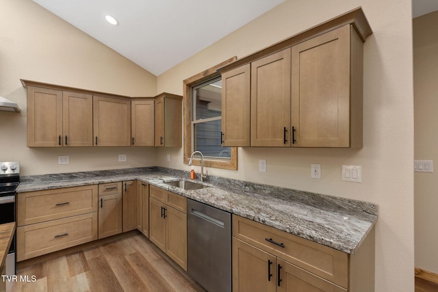 332 Tom Patterson Trl, Dandridge, TN 37725 - kitchen featuring stainless steel dishwasher, a sink, vaulted ceiling, light wood-type flooring, and light stone counters