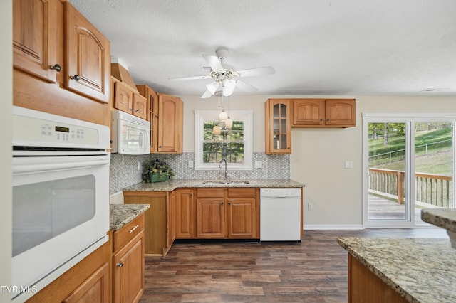 536 Chadwell Rd, Kingsport, TN 37660 - kitchen with a healthy amount of sunlight, decorative backsplash, a sink, and white appliances