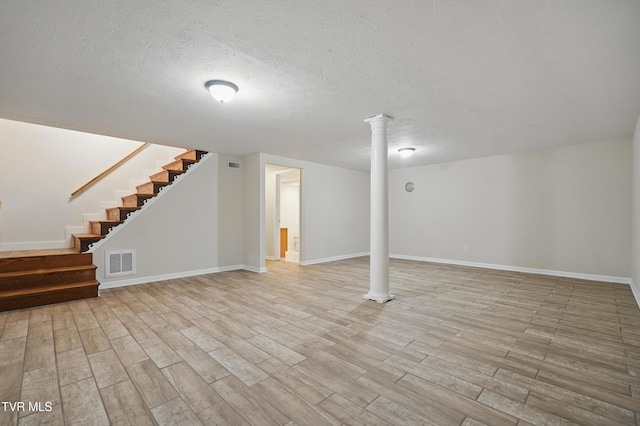 536 Chadwell Rd, Kingsport, TN 37660 - finished below grade area featuring baseboards, light wood-style flooring, visible vents, and stairs