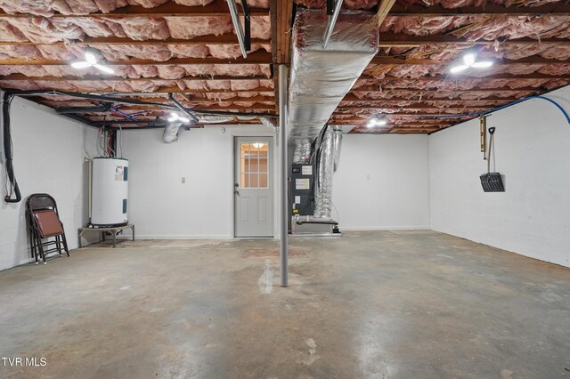 536 Chadwell Rd, Kingsport, TN 37660 - unfinished below grade area with heating unit and electric water heater