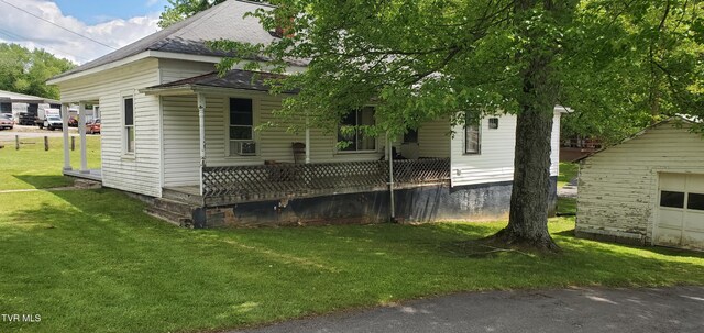 1167 Bloomingdale Pike, Kingsport, TN 37660 - exterior space with a shingled roof and a front yard