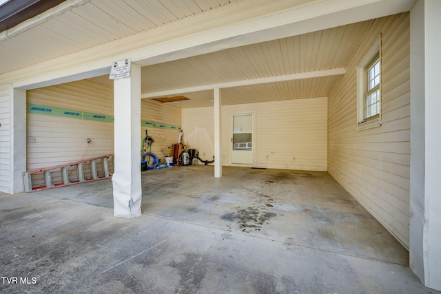garage with a carport