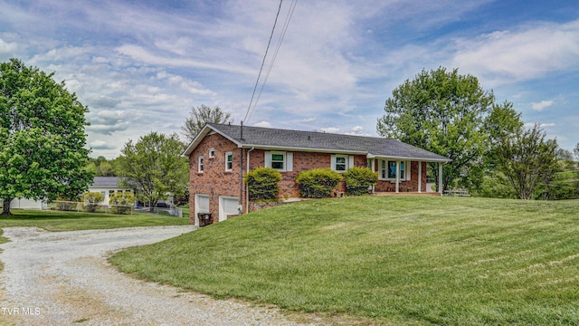 683 Ridge Rd, Piney Flats, TN 37686 - single story home with a garage, brick siding, gravel driveway, and a front yard