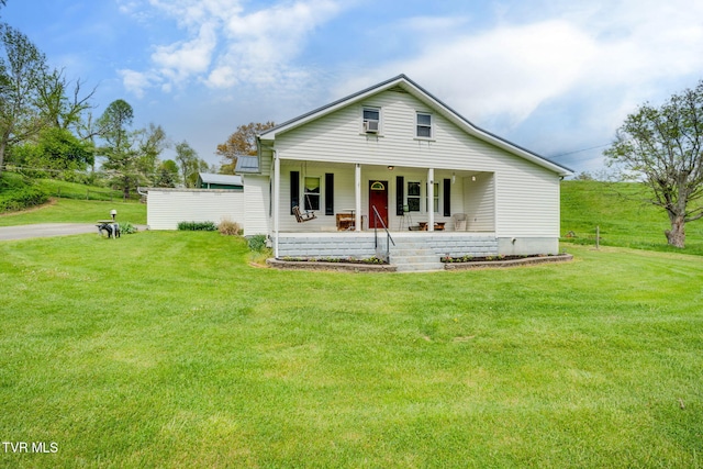 bungalow-style home featuring a porch and a front yard