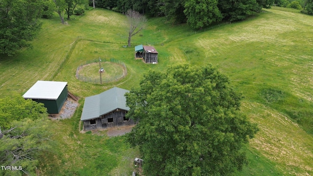 birds eye view of property featuring a rural view