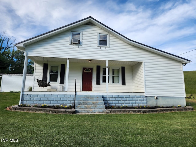 12075 Goose Creek Rd, Bristol, VA 24202 - view of front of home with covered porch, a front lawn, and cooling unit
