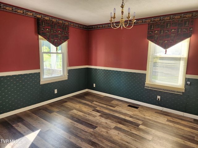 12075 Goose Creek Rd, Bristol, VA 24202 - unfurnished room featuring wood finished floors, wainscoting, a chandelier, wallpapered walls, and baseboards