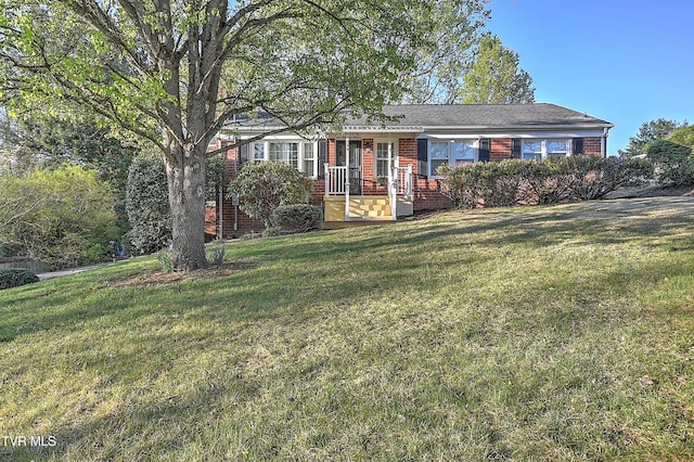 344 Virginia Dr, Bristol, VA 24201 - ranch-style house with brick siding and a front yard