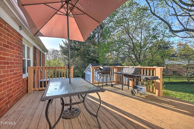 344 Virginia Dr, Bristol, VA 24201 - wooden deck featuring outdoor dining area