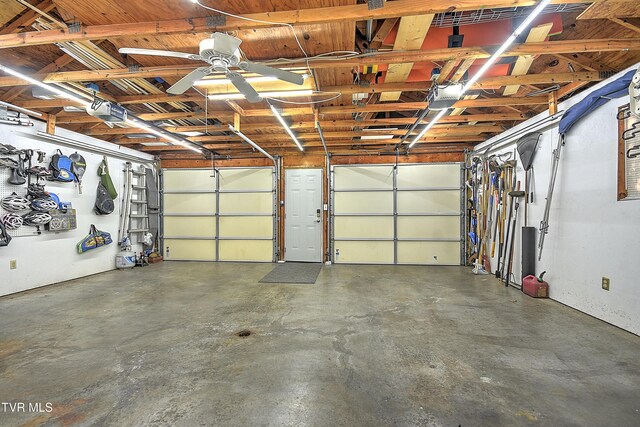 344 Virginia Dr, Bristol, VA 24201 - garage with a ceiling fan and a garage door opener