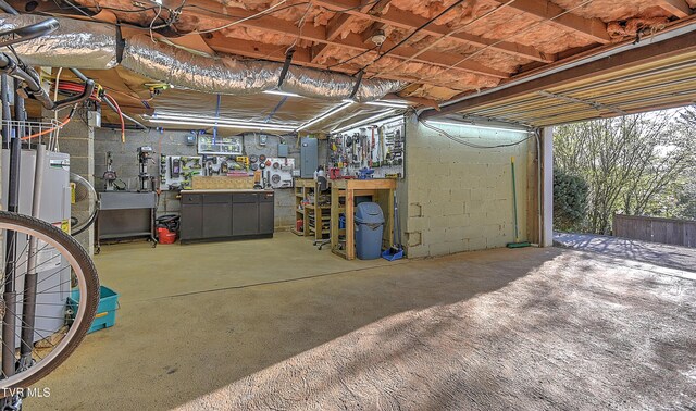 344 Virginia Dr, Bristol, VA 24201 - interior space with a workshop area and electric panel