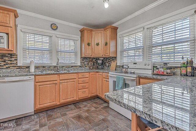 344 Virginia Dr, Bristol, VA 24201 - kitchen featuring backsplash, crown molding, a sink, and white appliances
