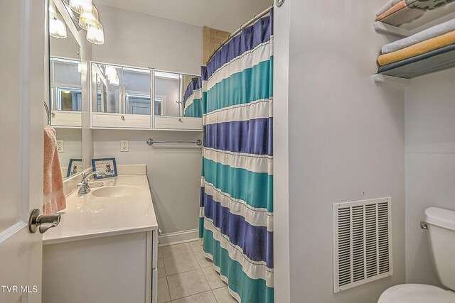 344 Virginia Dr, Bristol, VA 24201 - bathroom with visible vents, toilet, vanity, and tile patterned floors