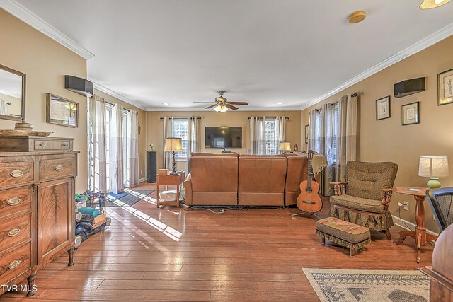 344 Virginia Dr, Bristol, VA 24201 - living room with dark wood-type flooring, crown molding, baseboards, and a ceiling fan