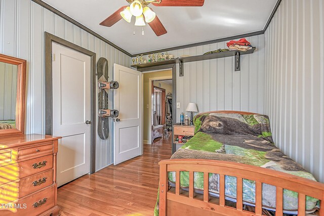 344 Virginia Dr, Bristol, VA 24201 - bedroom with ceiling fan, ornamental molding, and light wood-type flooring