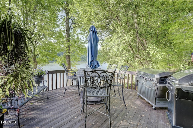768 Lake Point Dr, Piney Flats, TN 37686 - wooden terrace featuring outdoor dining area and a grill