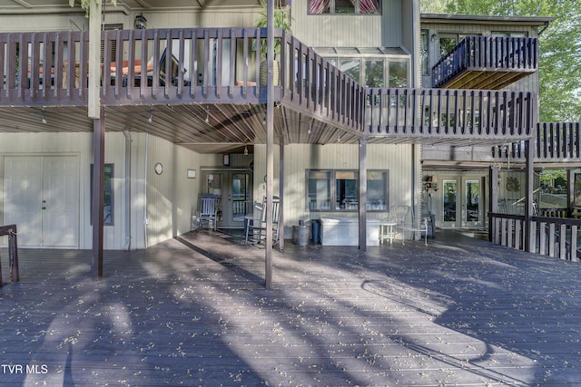 768 Lake Point Dr, Piney Flats, TN 37686 - back of property featuring a balcony, a deck, and french doors