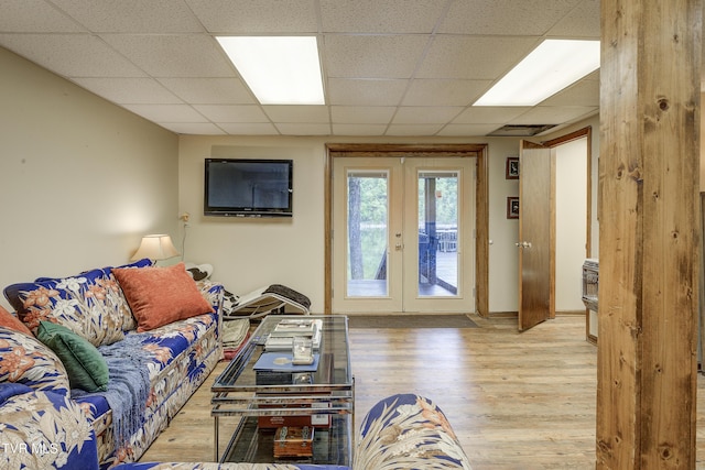 768 Lake Point Dr, Piney Flats, TN 37686 - living area featuring wood finished floors, french doors, and a paneled ceiling