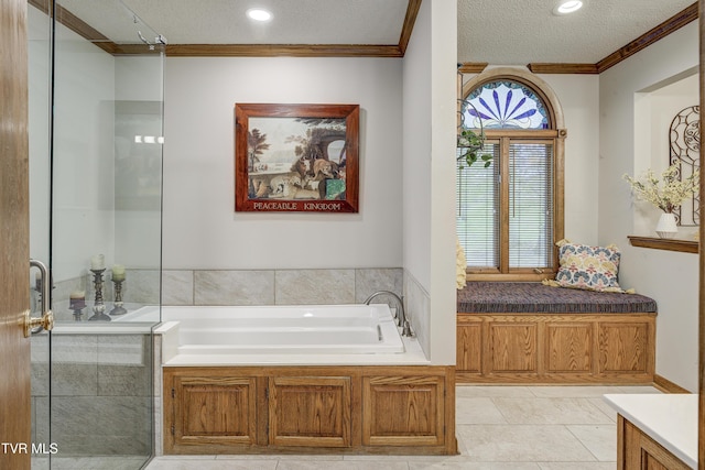 768 Lake Point Dr, Piney Flats, TN 37686 - bathroom featuring ornamental molding, a textured ceiling, recessed lighting, tile patterned flooring, and a bath