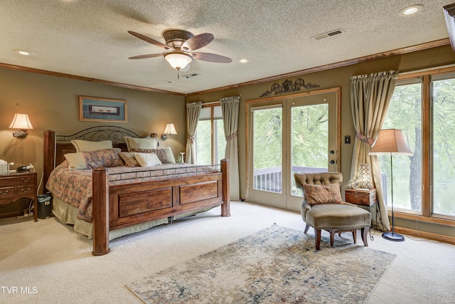 768 Lake Point Dr, Piney Flats, TN 37686 - carpeted bedroom featuring crown molding, a textured ceiling, visible vents, and access to exterior
